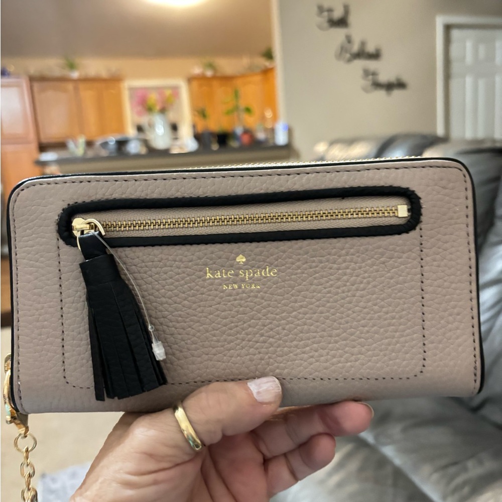 Kate Spade Beige Wallet with Black Tassel